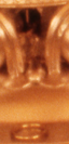 Cropped image of what appears to be a human figure inside the opening