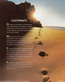 A face in footprints in the sand.